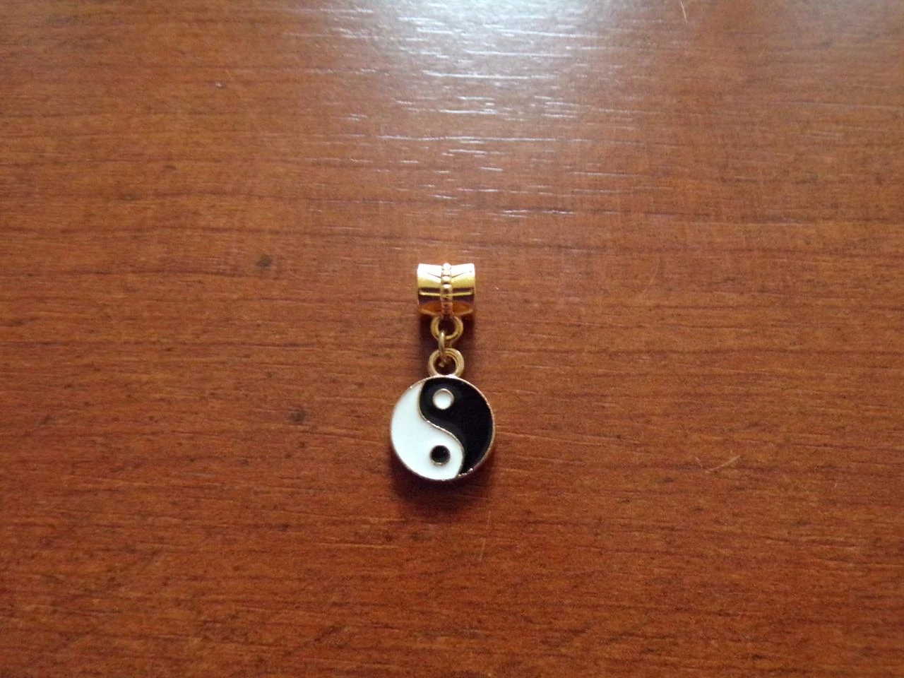 pendentif doré yin yang 12 x 16 mm